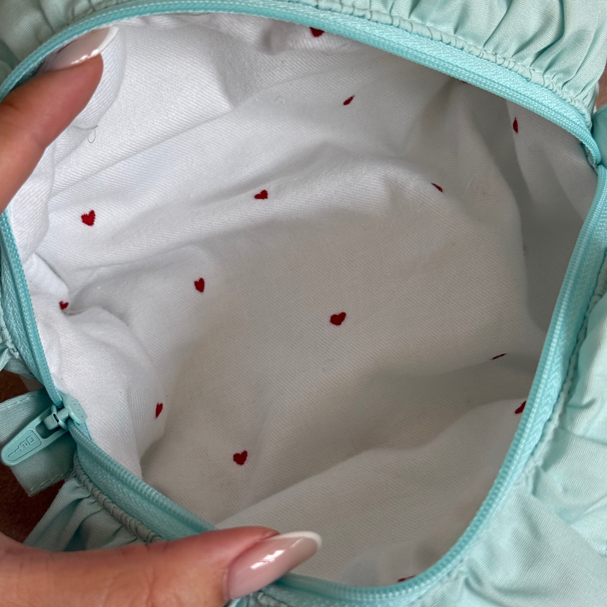 handmade soft quilted pastel pink yellow butter cream white green sage turquoise cosmetic pouch with personalized embroidery name customization ruffles pinterest aesthetic coquette ballerina core makeup bag beauty case vanity girly feminine minimalism princess barbie bridesmaids gift ideal outfit 