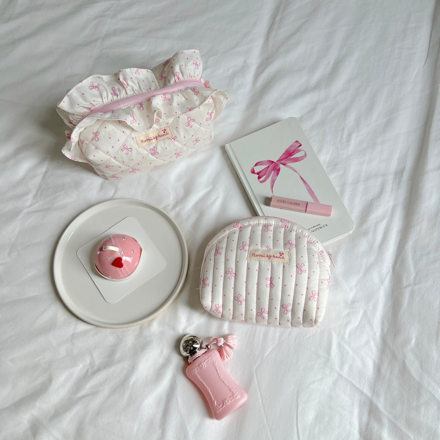 Túi đựng mỹ phẩm in nơ hồng thủ công