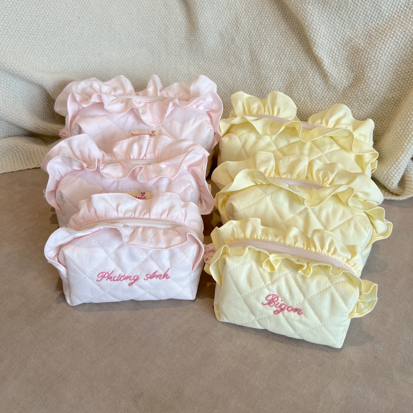 handmade soft quilted pastel pink yellow butter cream white green sage turquoise cosmetic pouch with personalized embroidery name customization ruffles pinterest aesthetic coquette ballerina core makeup bag beauty case vanity girly feminine minimalism princess barbie bridesmaids gift ideal outfit 